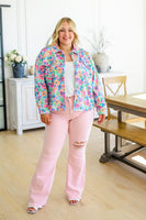 Feminine Flair Mid Rise Distressed Flares in Pastel Pink