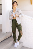 Kick Back Distressed Joggers In Olive
